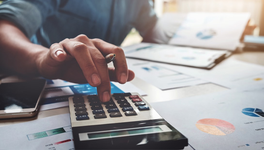 person calculating finances