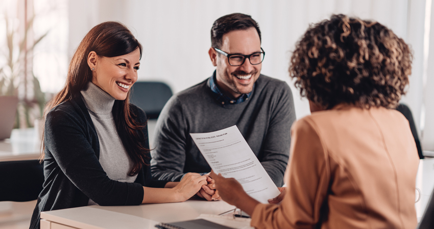 couple meeting with loan specialist