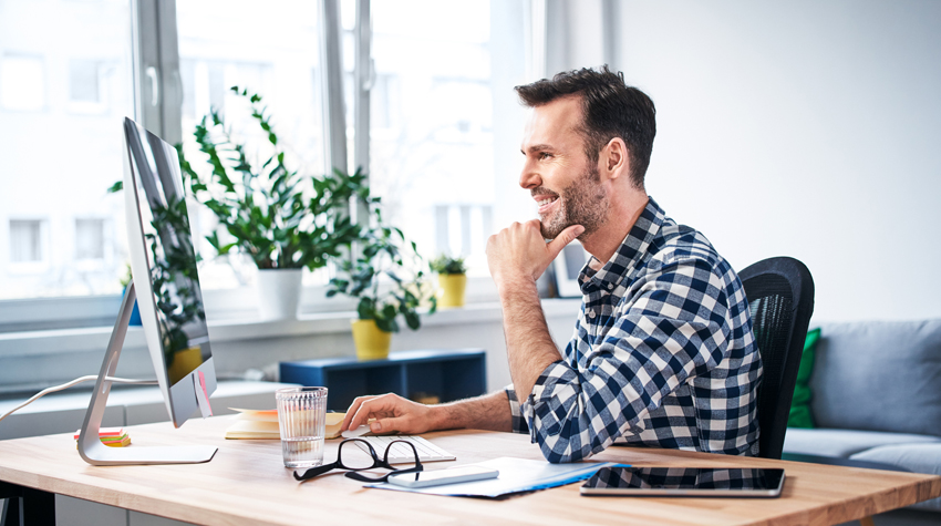 man working at his computer