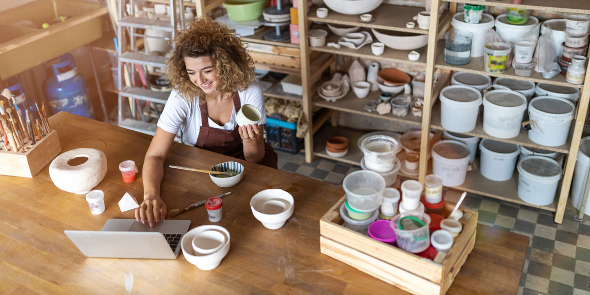 business owner online in ceramic shop